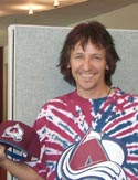 Stan loses a bet and has to dye his hair brown and wear a Colorado Avalanche shirt all day - 2002